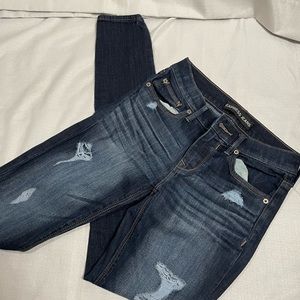 Express jeans midrise jeggings size 0, distressed dark blue rips